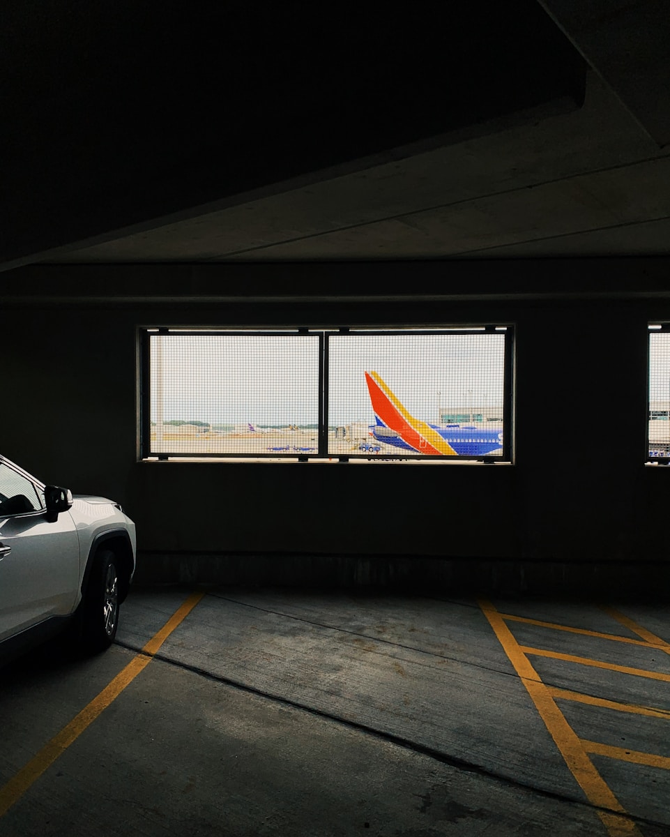 white car parked on parking lot